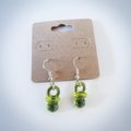 Boucles d’oreilles tétine jaune clair translucide – Bijoux fantaisie originaux | Collection Funny