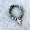Bracelet en Turquoise Africaine – Tortue & Grelot