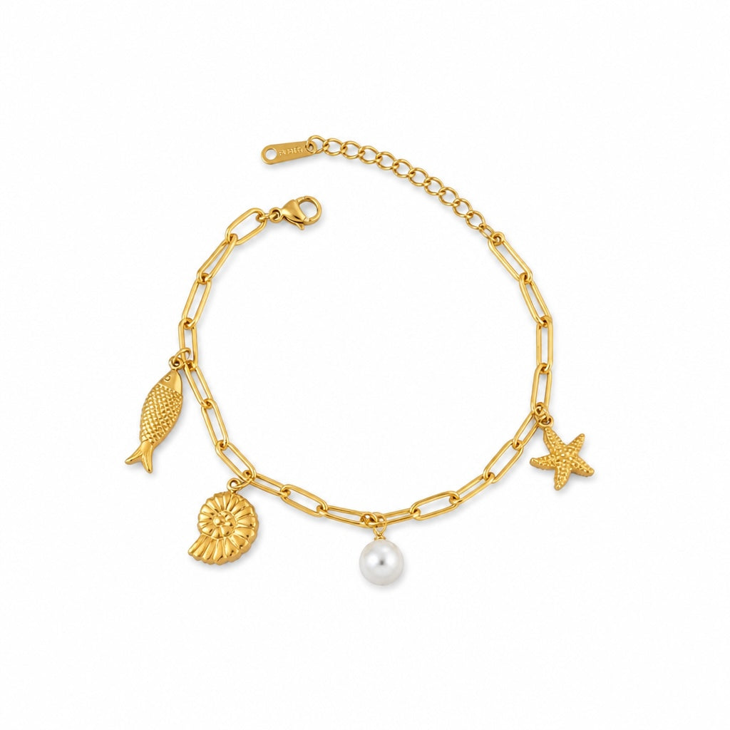 Bracelet La boutique d'Emma doré à maillons avec charms poisson, coquillage, étoile de mer et perle nacrée