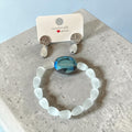 Parure La boutique d'Emma avec bracelet élastique en pierre de lune synthétique et boucles d'oreilles argentées