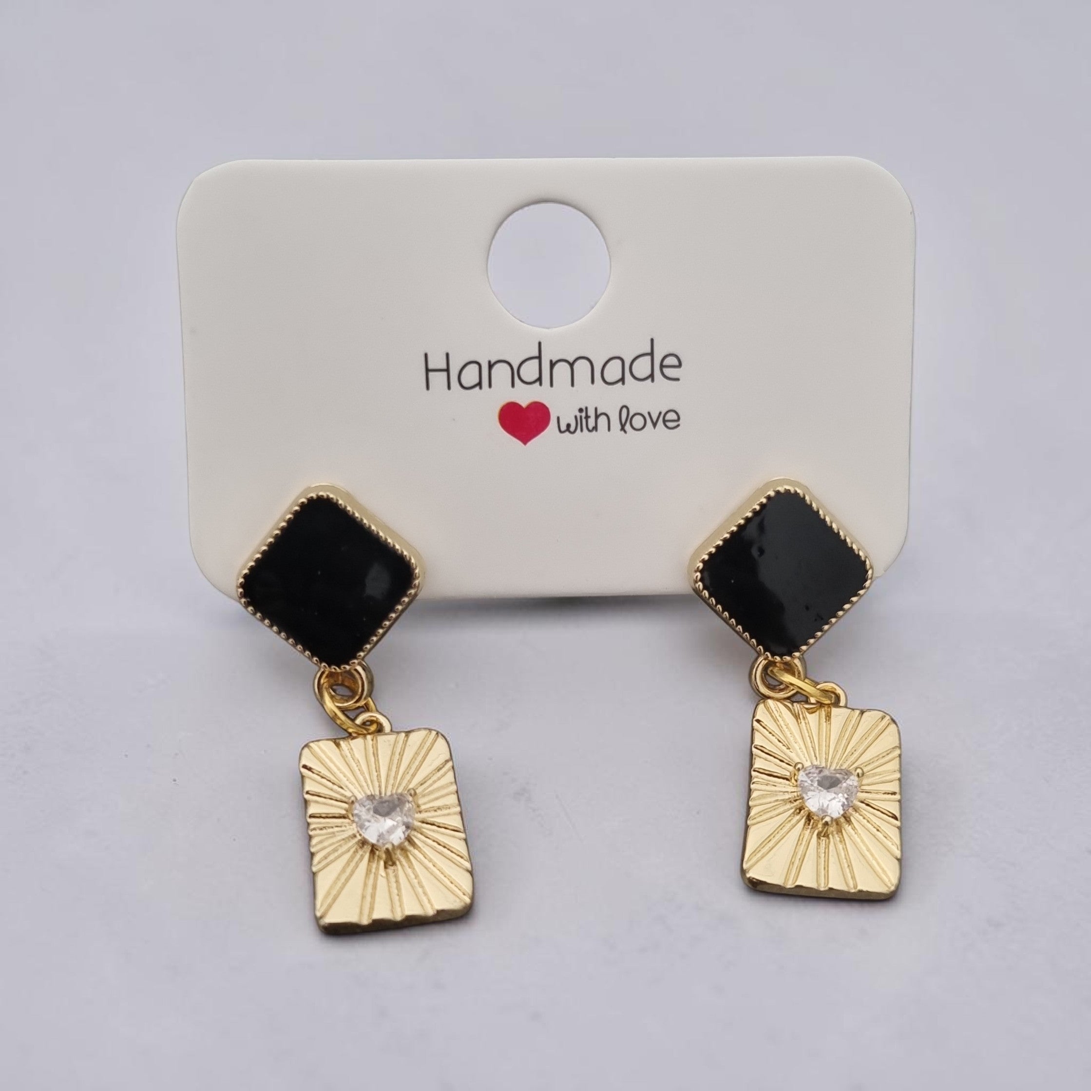 Boucles d’oreilles Eclat noir et cœur doré
